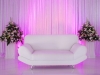 white-couch-stage-flowers